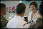 Mrs. Laura Bush visits during breakfast with military personnel Tuesday, Nov. 21, 2006, at the Officers Club at Hickam Air Force Base in Honolulu, Hawaii. White House photo by Shealah Craighead