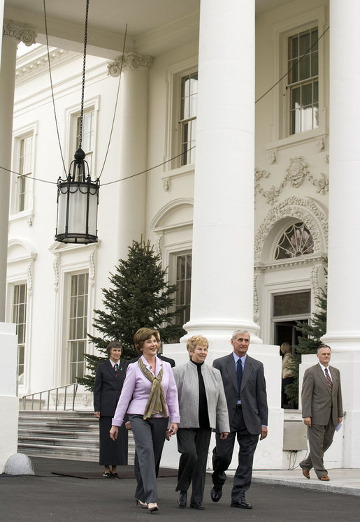 Mrs. Laura Bush walks with Margaret and Francis Botek of Lehighton, Pa., during the arrival of the official White House Christmas tree on the North Portico Monday, Nov. 27, 2006. The Botek family owns Crystal Springs Tree Farm and donated the 18-foot Douglas fir tree. White House photo by Shealah Craighead