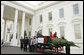 Mrs. Laura Bush stands with the Botek family of Lehighton, Pa., as she receives the official White House Christmas tree on the North Portico Monday, Nov. 27, 2006. The Botek family owns Crystal Springs Tree Farm and donated the 18-foot Douglas fir tree. White House photo by Shealah Craighead