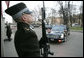 An honor guard stands at attention as the limousine carrying President George W. Bush arrives Tuesday, Nov. 28, 2006, at Riga Castle in Riga, Latvia, where the President met with Latvian President Vaira Vike-Freiberga. White House photo by Eric Draper