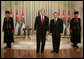 President George W. Bush and King Abdullah II of Jordan stand for photos Wednesday, Nov. 29, 2006, at Raghadan Palace in Amman, Jordan, where they met for dinner. White House photo by Eric Draper