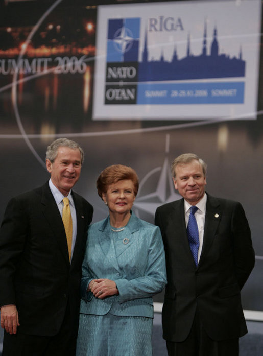President George W. Bush stands with President Vaira Vike-Freiberga of Latvia, and NATO Secretary General Jaap de Hoop Scheffer during a photo opportunity Wednesday, Nov. 29, 2006, at the start of the 2006 NATO Summit in Riga, Latvia. White House photo by Paul Morse