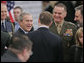 President George W. Bush talks with fellow NATO heads of state and government during the 2006 NATO Summit Wednesday, Nov. 29, 2006, in Riga, Latvia. White House photo by Paul Morse