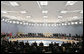 NATO heads of state and government are seated during opening remarks Wednesday, Nov. 29, 2006, during the 2006 NATO Summit at the Olympic Sports Center in Riga, Latvia. White House photo by Paul Morse