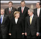 President George W. Bush and Chancellor Angela Merkel of Germany join other NATO heads of state and government for the official portrait Wednesday, Nov. 29, 2006, at the 2006 NATO Summit in Riga, Latvia. White House photo by Paul Morse