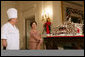 Mrs. Laura Bush and former chef Ronald Mesnier discusses the gingerbread White House with the press in the State Dining Room Thursday, Nov. 30, 2006. The house consists of more than 300 pounds of dark chocolate and gingerbread. White House photo by Shealah Craighead
