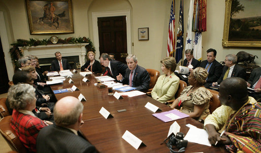 President George W. Bush and Laura Bush host a meeting on World AIDS Day in the Roosevelt Room at the White House, Friday, Dec. 1, 2006. As this World AIDS Day marks the 25th anniversary of the discovery of the HIV virus, President Bush said, “It is a day for the world to recognize the fact that there are 39 million people living with HIV/AIDS, and a day to remember the fact that 25 million people have died of AIDS.” White House photo by Eric Draper