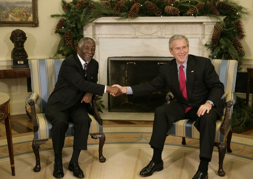 President George W. Bush welcomes Thabo Mbeki, President of South Africa, to the Oval Office Friday, Dec. 8, 2006. The leaders talked about a wide range of subjects, according to the President, ".including Darfur and the need for South Africa and the United States and other nations to work with the Sudanese government to enable a peacekeeping force into that country to facilitate aid and save lives." White House photo by Paul Morse