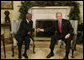President George W. Bush welcomes Thabo Mbeki, President of South Africa, to the Oval Office Friday, Dec. 8, 2006. The leaders talked about a wide range of subjects, according to the President, ".including Darfur and the need for South Africa and the United States and other nations to work with the Sudanese government to enable a peacekeeping force into that country to facilitate aid and save lives." White House photo by Paul Morse