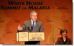 President George W. Bush, joined by Laura Bush, addresses participants at the first-ever White House Summit on Malaria, Thursday, Dec, 14, 2006, at the National Geographic Society in Washington, D.C. President Bush’s Malaria Initiative is a five-year $1.2 billion program to eradicate malaria in 15 countries.  White House photo by Shealah Craighead