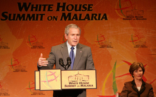 President George W. Bush, joined by Laura Bush, addresses participants at the first-ever White House Summit on Malaria, Thursday, Dec, 14, 2006, at the National Geographic Society in Washington, D.C. President Bush’s Malaria Initiative is a five-year $1.2 billion program to eradicate malaria in 15 countries. White House photo by Shealah Craighead