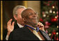 B.B. King breaks out in laughter as he's presented with the Presidential Medal of Freedom Friday, Dec. 15, 2006, by President George W. Bush in the East Room of the White House. Introducing the musician, President Bush told the audience, when speaking of the blues, "two names are paramount. B.B. King, and his guitar, Lucille. America loves the music of B.B. King, and America loves the man, himself." White House photo by Shealah Craighead