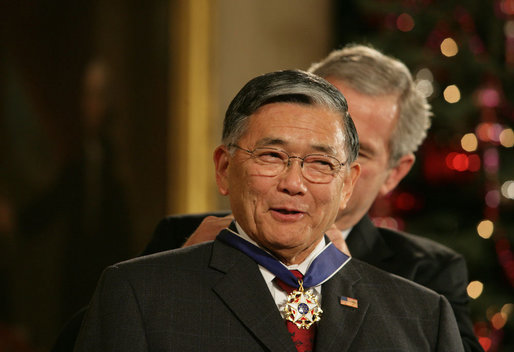 President George W. Bush presents the 2006 Presidential Medal of Freedom to former Secretary of Transportation Norman Mineta during ceremonies Friday, Dec. 15, 2006, in the East Room of the White House. Upon introduction, President Bush said, "Norman Mineta's whole life has been an extraordinary journey. he has given his country a lifetime of leadership, devotion to duty and personal character." White House photo by Shealah Craighead