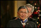 President George W. Bush presents the 2006 Presidential Medal of Freedom to former Secretary of Transportation Norman Mineta during ceremonies Friday, Dec. 15, 2006, in the East Room of the White House. Upon introduction, President Bush said, "Norman Mineta's whole life has been an extraordinary journey. he has given his country a lifetime of leadership, devotion to duty and personal character." White House photo by Shealah Craighead