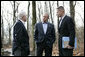 President George W. Bush discusses Iraq policy with Secretary of Defense Robert Gates, left, and Chairman of the Joint Chiefs of Staff General Peter Pace at Camp David, Saturday, Dec. 23, 2006.  White House photo by Eric Draper