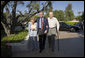 President George W. Bush walks with Former President Gerald Ford and Betty Ford after arriving for a visit in Rancho Mirage, California, Sunday, April 23, 2006. White House photo by Eric Draper