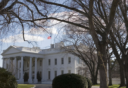 The American flag flies at half-staff over the White House in respect to the passing of former President Gerald R. Ford Wednesday, Dec. 27, 2006. President Ford died at his home in Rancho Mirage, Calif., Tuesday evening, Dec. 26. 