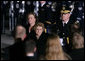 Former first lady Betty Ford and her daughter, Susan Ford Bales are escorted by Major General Guy Swan III upon the arrival of the casket of former President Gerald R. Ford to Andrews Air Force Base, Md., Saturday evening, Dec. 30, 2006, for the State Funeral ceremonies at the U.S. Capitol. White House photo by Shealah Craighead