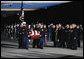 Vice President Dick Cheney leads the group of honorary pallbearers in saluting the casket of former President Gerald R. Ford upon its arrival at Andrews Air Force Base in Maryland, Saturday, December 30, 2006, for the State Funeral ceremonies at the U.S. Capitol. White House photo by David Bohrer