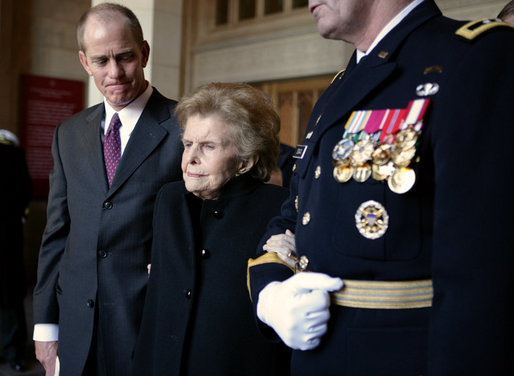 Former first lady Betty Ford is escorted by her son Steve Ford and Major General Guy Swan III following the State Funeral service for former President Gerald R. Ford at the National Cathedral in Washington, D.C., Tuesday, January 2, 2007. White House photo by David Bohrer