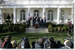 President George W. Bush stands with members of his Cabinet in the Rose Garden at the White House, Wednesday, Jan. 3, 2007, as he addresses members of media following the first Cabinet meeting of 2007.  White House photo by Eric Draper