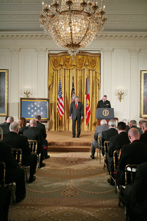 President George W. Bush bows his head before a Medal of Honor ceremony for Corporal Jason Dunham of the Marine Corps in the East Room Thursday, Jan. 11, 2007. "Since World War II, more than half of those who have been awarded the Medal of Honor have lost their lives in the action that earned it. Corporal Jason Dunham belongs to this select group. On a dusty road in western Iraq, Corporal Dunham gave his own life so that the men under his command might live. This morning it's my privilege to recognize Corporal Dunham's devotion to the Corps and country -- and to present his family with the Medal of Honor," said the President. White House photo by Paul Morse