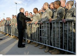 President George W. Bush shakes hands with U.S. Army soldiers as he prepares to depart Fort Benning, Ga., Thursday, Jan. 11, 2007.  White House photo by Eric Draper