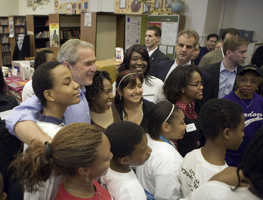 President George W. Bush spends time with volunteers during Martin Luther King, Jr. Day at Cardozo Senior High School in Washington, D.C., Monday, Jan. 15, 2007. "One of the things that Mrs. King wanted was for MLK Day to be a day of service. It is not a day off, but it's a day on," said the President. "And so I'm here at Cardozo High School to thank the hundreds of people who have showed up to serve the country by volunteering." White House photo by Paul Morse