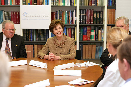 Mrs. Laura Bush and US Ambassador Craig Stapleton, left, participate in a roundtable discussion at the American Hospital of Paris Tuesday, Jan. 16, 2007, in Neuilly-on-Seine, France. White House photo by Shealah Craighead
