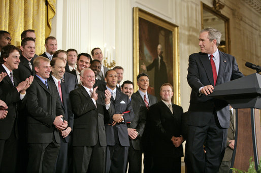 President George W. Bush looks back to MVP David Eckstein during his remarks honoring the St. Louis Cardinals, who won the 2006 World Series Championship, in the East Room Tuesday, Jan. 16, 2007. White House photo by Eric Draper
