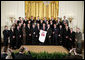 President George W. Bush stands with the 2006 World Series Champions, The St. Louis Cardinals, in the East Room Tuesday, Jan. 16, 2007. White House photo by Paul Morse