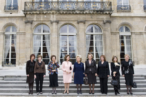 Mrs. Laura Bush stands outside Elysee Palace with other first lady attendees at the Conference on Missing and Exploited Children in Paris Wednesday, Jan. 17, 2007. The conference is hosted by Madame Bernadette Chirac, pictured in the center. White House photo by Shealah Craighead