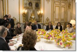 Mrs. Laura Bush attends a luncheon hosted by Madame Bernadette Chirac for the Conference on Missing and Exploited Children at the Elysee Palace in Paris Wednesday, Jan. 17, 2007. President Jacque Chirac of France is pictured in the center. White House photo by Shealah Craighead