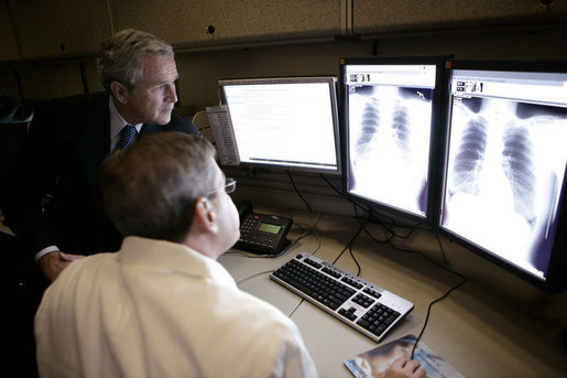 President George W. Bush visits with radiologist Dr. Jeffrey Kunin during a briefing on new x-ray technology at the Saint Luke’s-Lee’s Summit hospital in Lee’s Summit, Mo., Thursday, Jan 25, 2007. President Bush also participated in a roundtable discussion on health care initiatives at the hospital. White House photo by Eric Draper