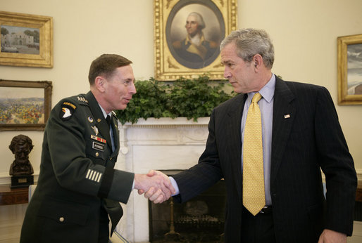 President George W. Bush welcomes Army General David Petraeus, incoming Commander of the Multi-National Force-Iraq, Friday, Jan. 26, 2007, to the Oval Office. White House photo by Eric Draper