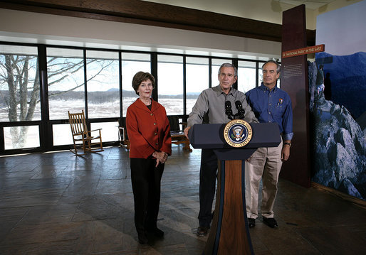 President George W. Bush addresses the press during a visit to Shenandoah National Park in Luray, Va., with Mrs. Laura Bush and Interior Secretary Dirk Kempthorne Wednesday, Feb. 7, 2007. "It is one thing to talk; it's another thing to act," said President Bush. "And I've just submitted a budget to the United States Congress. In it we've got a billion dollars new money for operating expenses." White House photo by Paul Morse