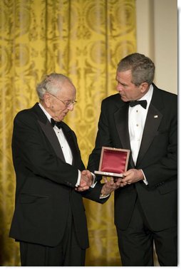 President George W. Bush thanks David Herbert Donald for his scholarship in preserving the legacy of President Abraham Lincoln’s life while at a dinner in honor of the Ford’s Theatre Abraham Lincoln Bicentennial Celebration Sunday, Feb. 11, 2007, in the East Room. "As we approach the bicentennial of President Lincoln’s birth," said President Bush, "his words and principles continue to guide our nation." White House photo by Paul Morse