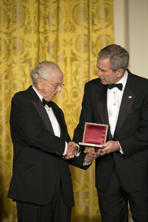 President George W. Bush thanks David Herbert Donald for his scholarship in preserving the legacy of President Abraham Lincoln’s life while at a dinner in honor of the Ford’s Theatre Abraham Lincoln Bicentennial Celebration Sunday, Feb. 11, 2007, in the East Room. "As we approach the bicentennial of President Lincoln’s birth," said President Bush, "his words and principles continue to guide our nation." White House photo by Paul Morse