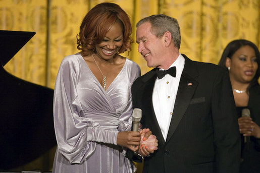 President George W. Bush thanks Yolanda Adams after her performance at a dinner in honor of the Ford’s Theatre Abraham Lincoln Bicentennial Celebration Sunday, Feb. 11, 2007. White House photo by Paul Morse