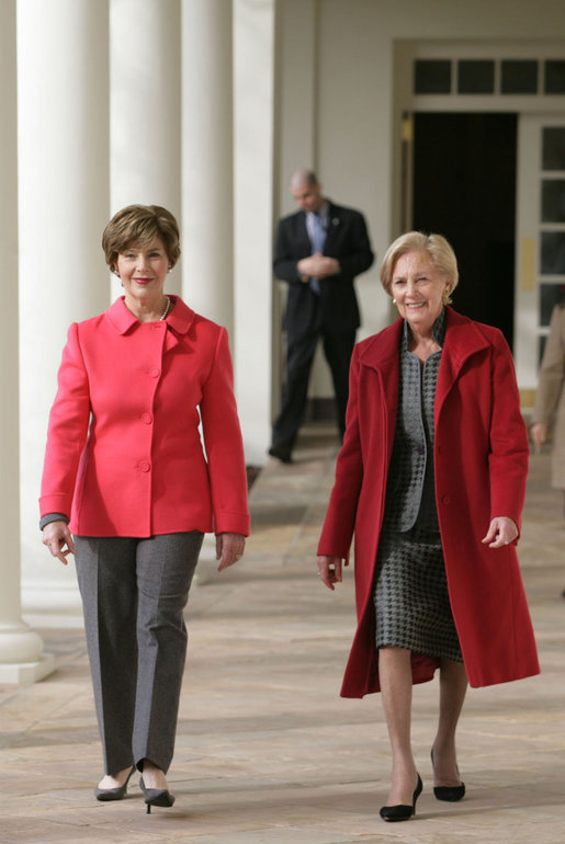 Mrs. Laura Bush walks with Alma Adamkus, the First Lady of Lithuania, along the colonnade in the Rose Garden during a visit to the White House Monday, Feb. 12, 2007. White House photo by Shealah Craighead