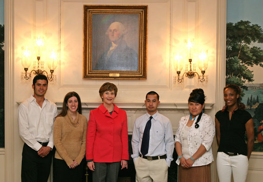 Mrs. Laura Bush stands with the recipients of the 2007 Corps Member of the Year Award at the White House on Monday, Feb. 12, 2007. Pictured with Mrs. Bush from left, are recipients: Rosalio “Leo” Cardenas, 23, Alana Svensen, 26, Cop Lieu, 18, Yvette Chischillie, 23, and Tatiana Rodrigues, 19. As part of the Helping America's Youth Initiative, The Corp Network engages disadvantaged youth in education, career preparation and life skill development and honors youth who become involved in their communities, overcome adversity, and become role models for America’s young people. White House photo by Shealah Craighead