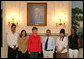 Mrs. Laura Bush stands with the recipients of the 2007 Corps Member of the Year Award at the White House on Monday, Feb. 12, 2007. Pictured with Mrs. Bush from left, are recipients: Rosalio “Leo” Cardenas, 23, Alana Svensen, 26, Cop Lieu, 18, Yvette Chischillie, 23, and Tatiana Rodrigues, 19. As part of the Helping America's Youth Initiative, The Corp Network engages disadvantaged youth in education, career preparation and life skill development and honors youth who become involved in their communities, overcome adversity, and become role models for America’s young people. White House photo by Shealah Craighead