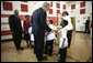 President George W. Bush visits with children at YMCA Anthony Bowen in Washington, D.C., Tuesday, Feb. 13, 2007. White House photo by Eric Draper