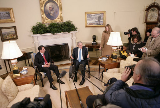 President George W. Bush talks with members of the media during his meeting with Panama’s President Martin Torrijos in the Oval Office, Friday, Feb. 16, 2007. White House photo by Eric Draper
