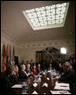President George W. Bush talks to reporters during a meeting on health care initiatives in the Roosevelt Room at the White House, Tuesday, Feb. 20, 2007. White House photo by Eric Draper