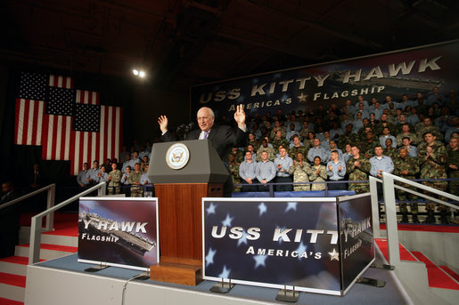 Vice President Dick Cheney waves in response to a welcome Wednesday, Feb. 21, 2007, from troops aboard the USS Kitty Hawk at Yokosuka Naval Base in Japan. White House photo by David Bohrer
