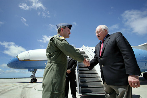 Vice President Dick Cheney is greeted by Brigadier General Doug Owens, Commander, 36th Wing, Thursday, Feb. 22, 2007, upon arrival to Andersen Air Force Base, Guam, for a rally with U.S. troops. White House photo by David Bohrer