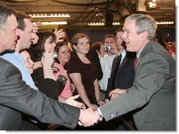 President George W. Bush shakes hands with employees and guests following his participation at an energy forum discussion and tour at Novozymes North America, Inc., Thursday, Feb. 22, 2007 in Franklinton, N.C.  White House photo by Paul Morse