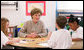 Mrs. Laura Bush participates in a discussion with children in a Boys & Girls Club program Thursday, Feb. 22, 2007 at the D’Iberville Elementary School in D’Iberville, Miss. White House photo by Shealah Craighead