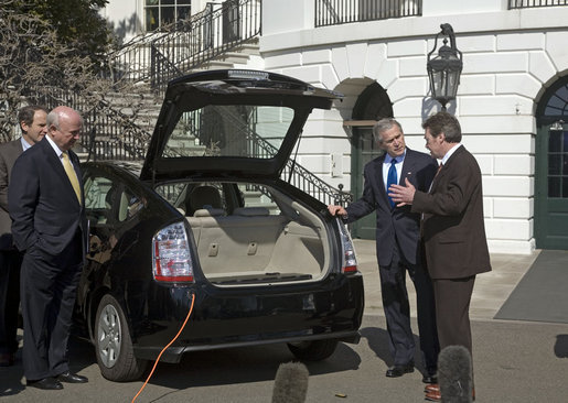 President George W. Bush takes part in a demonstration of alternative fuel automobiles on the South Lawn of the White House Friday, Feb. 23, 2007. "But I firmly believe that the goal I laid out, that Americans will use 20 percent less gasoline over the next 10 years is going to be achieved, and here's living proof of how we're going to get there," said the President. White House photo by Paul Morse